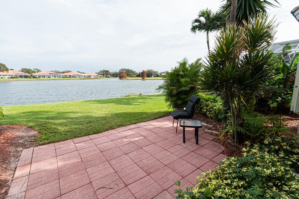 View of patio with a water view