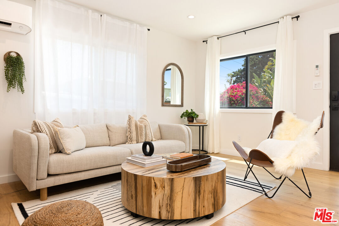 a living room with furniture and couch