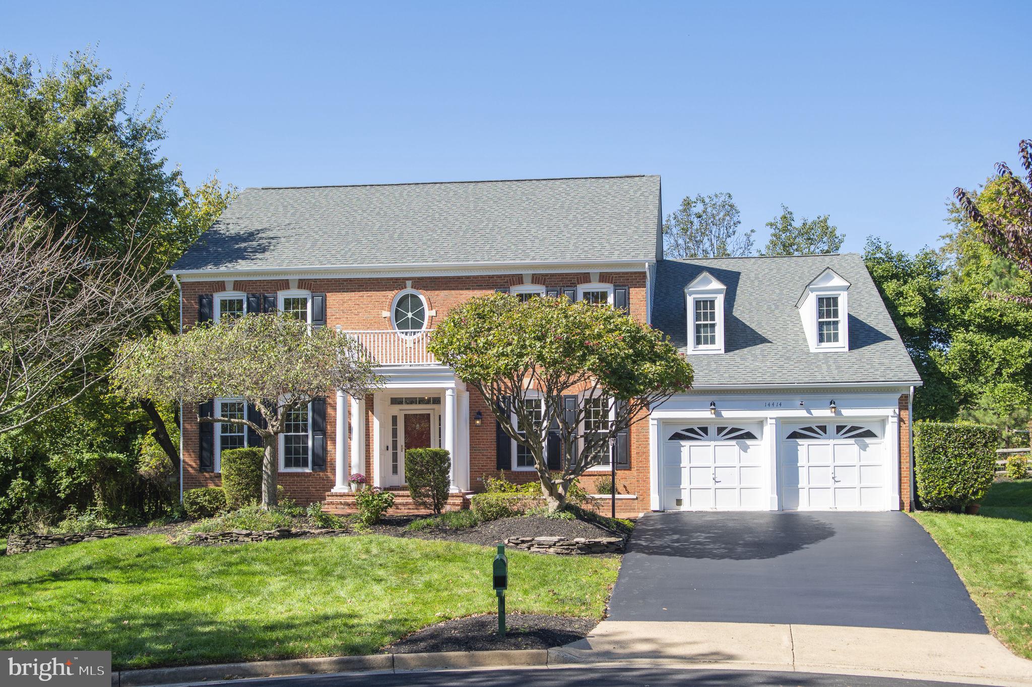 front view of house with a yard