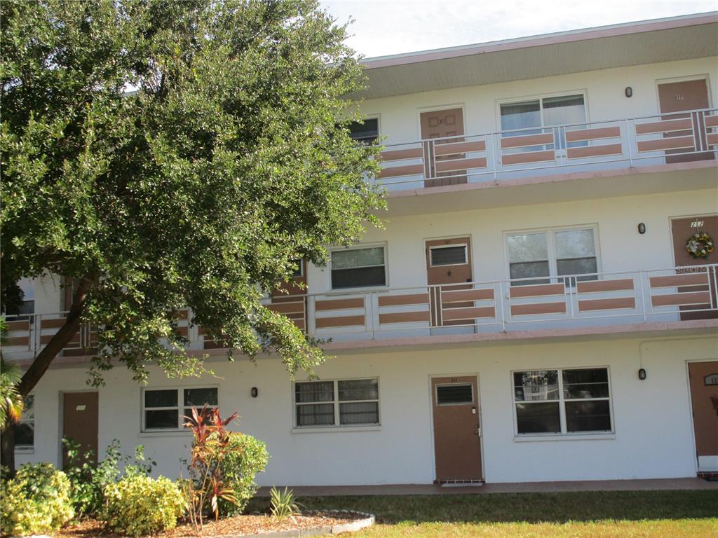 a front view of a multi story residential apartment building