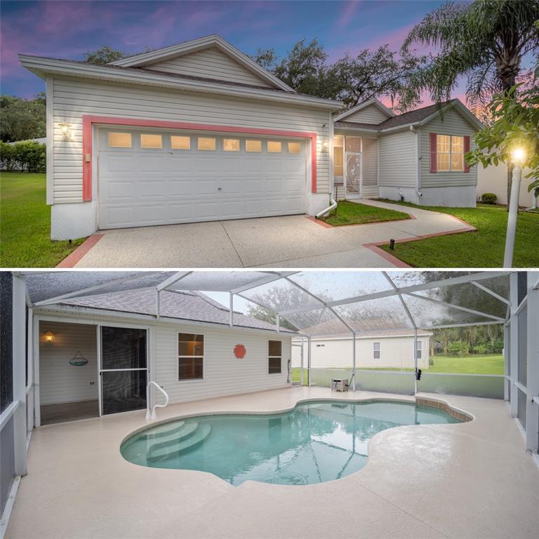 a view of a house with a yard and garage