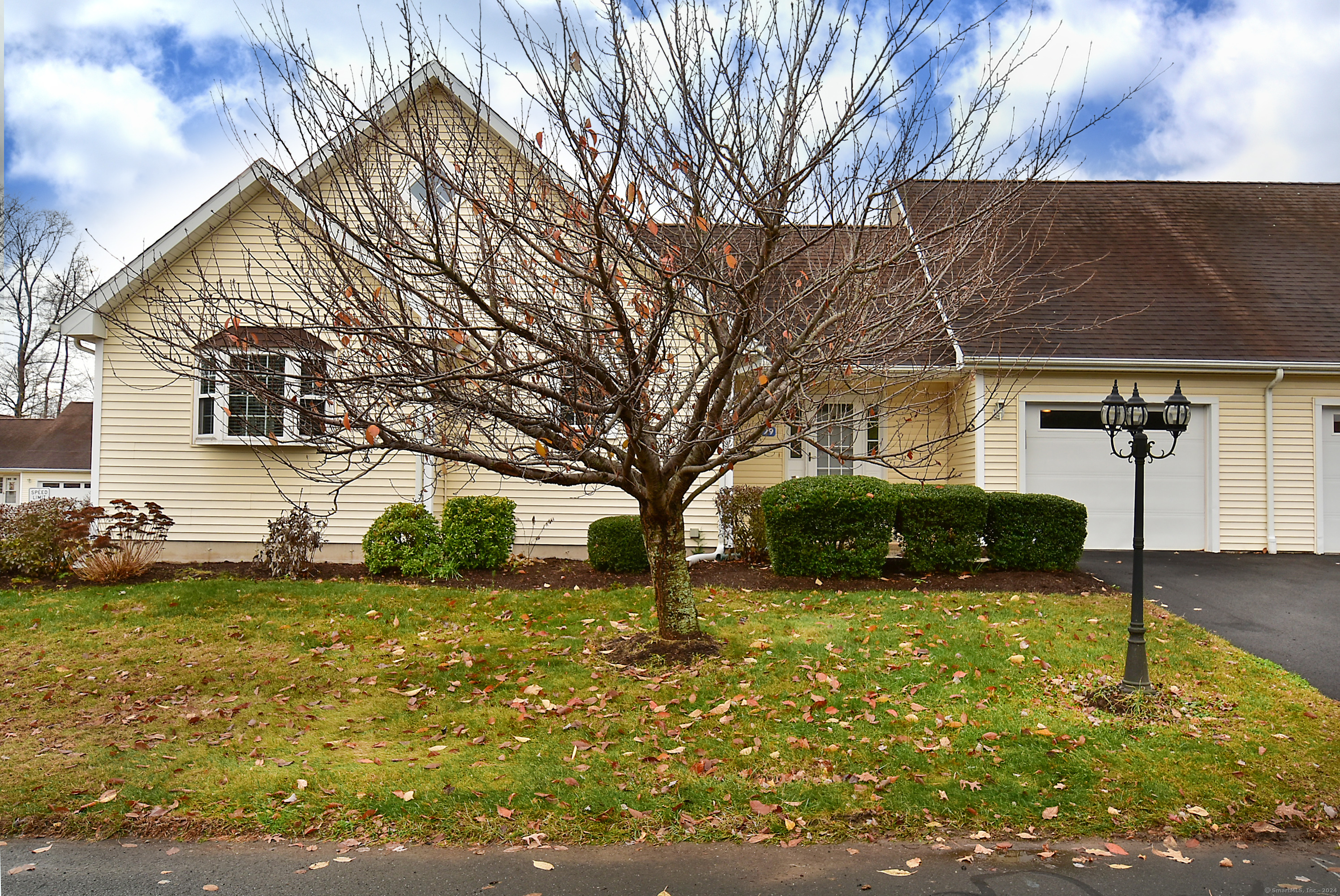 a view of a house with a yard