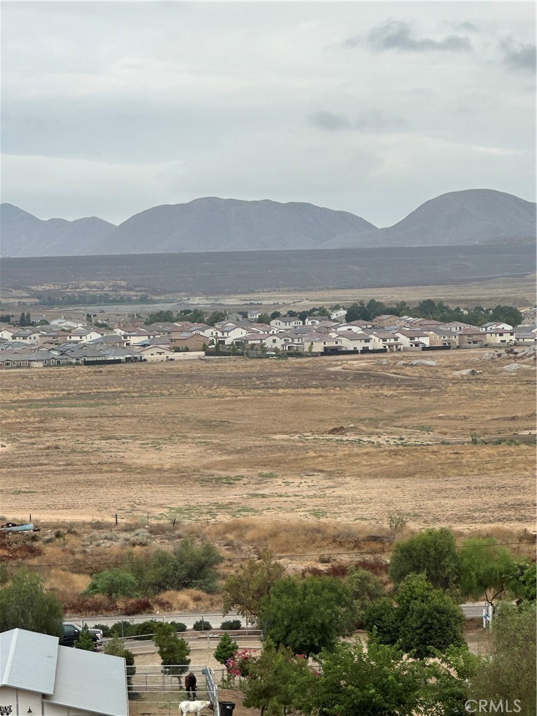 a view of an ocean and mountain