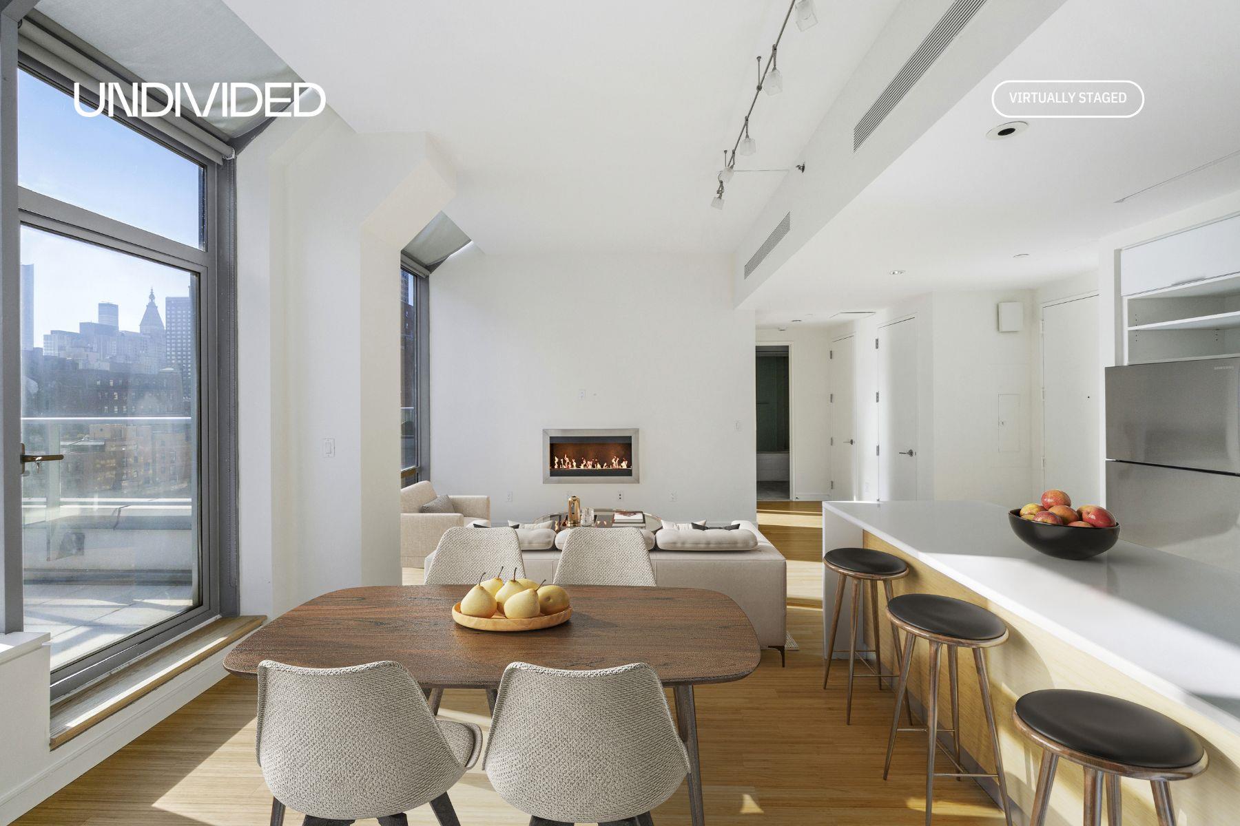 a dining room with furniture a large window and stainless steel appliances