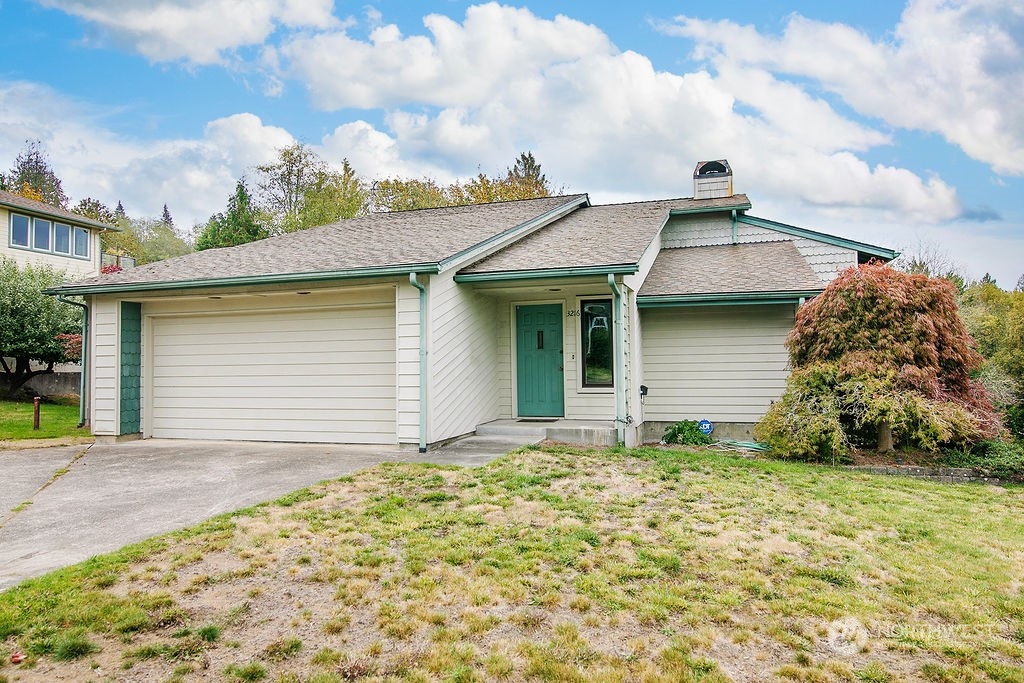 front view of house with a yard