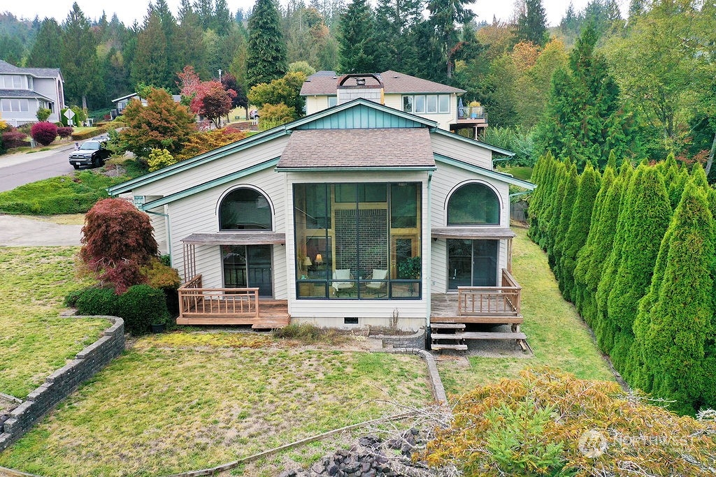 a front view of a house with garden