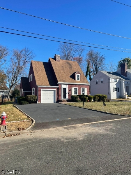 front view of a house with a street