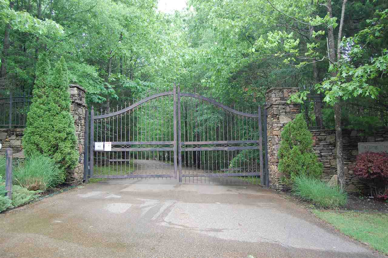 a view of a fence with a small deck