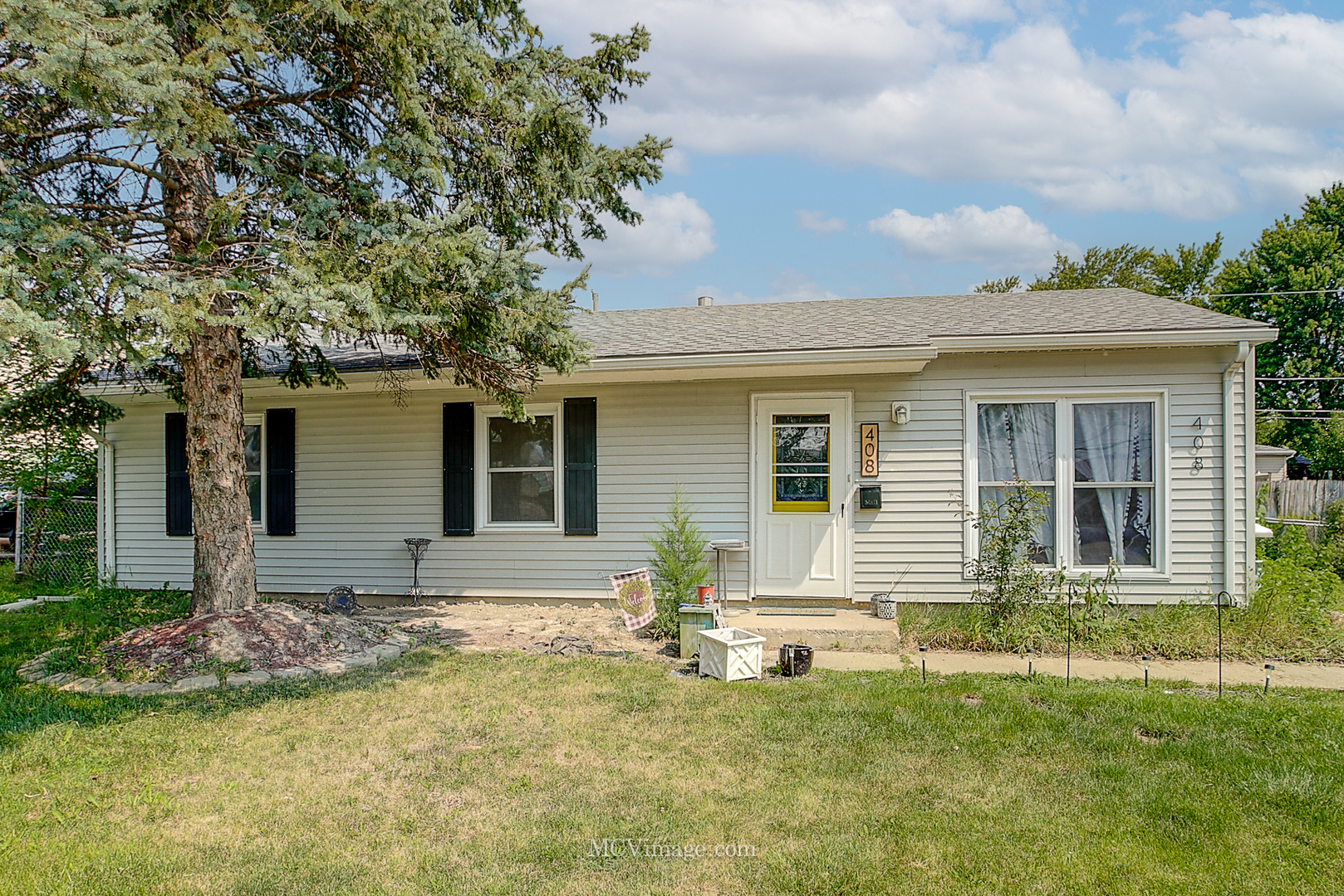 front view of house with a yard