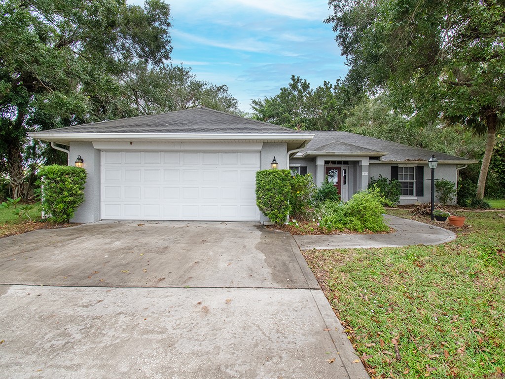 front view of a house with a yard