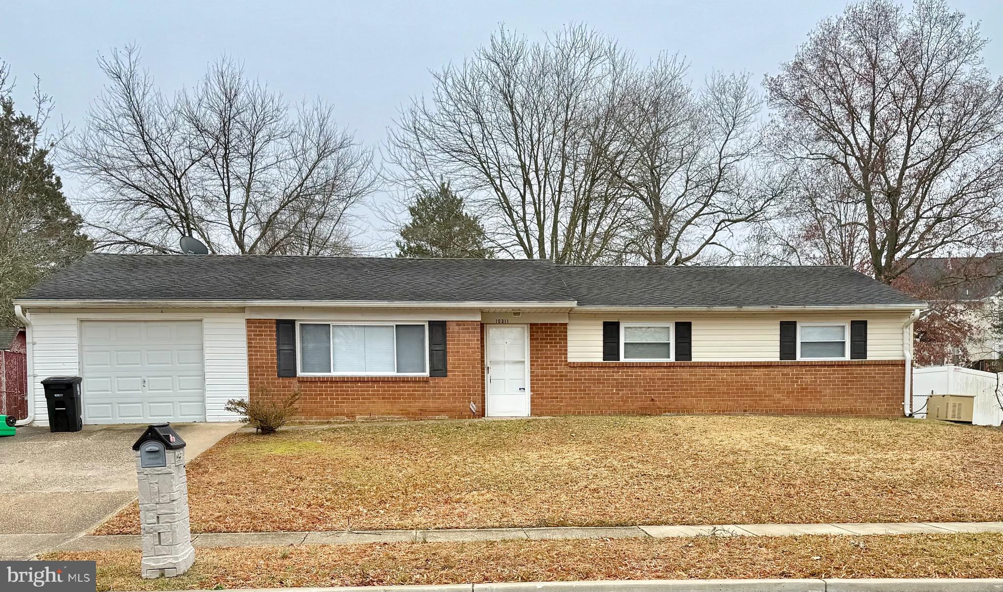 front view of house with a yard