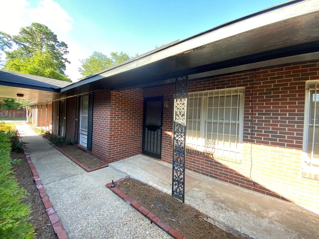 a front view of a house with a garage