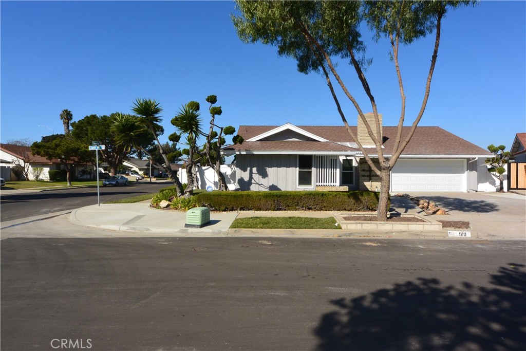 a view of a house with a street