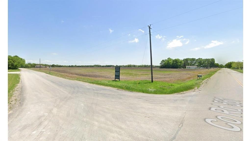 a view of a lake with a big yard