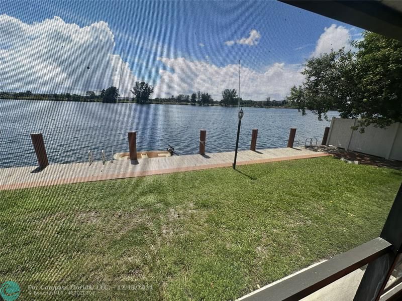 a view of a lake with outdoor space