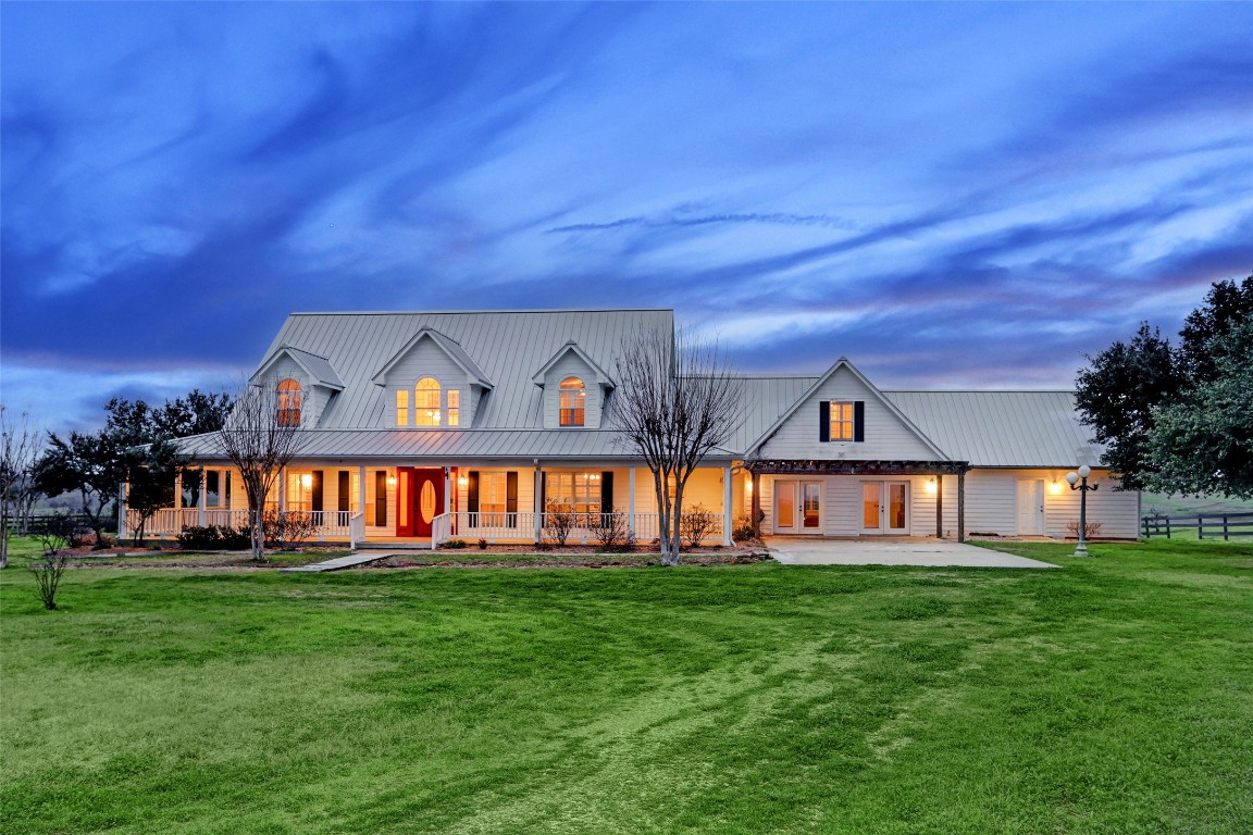 front view of a house with a big yard