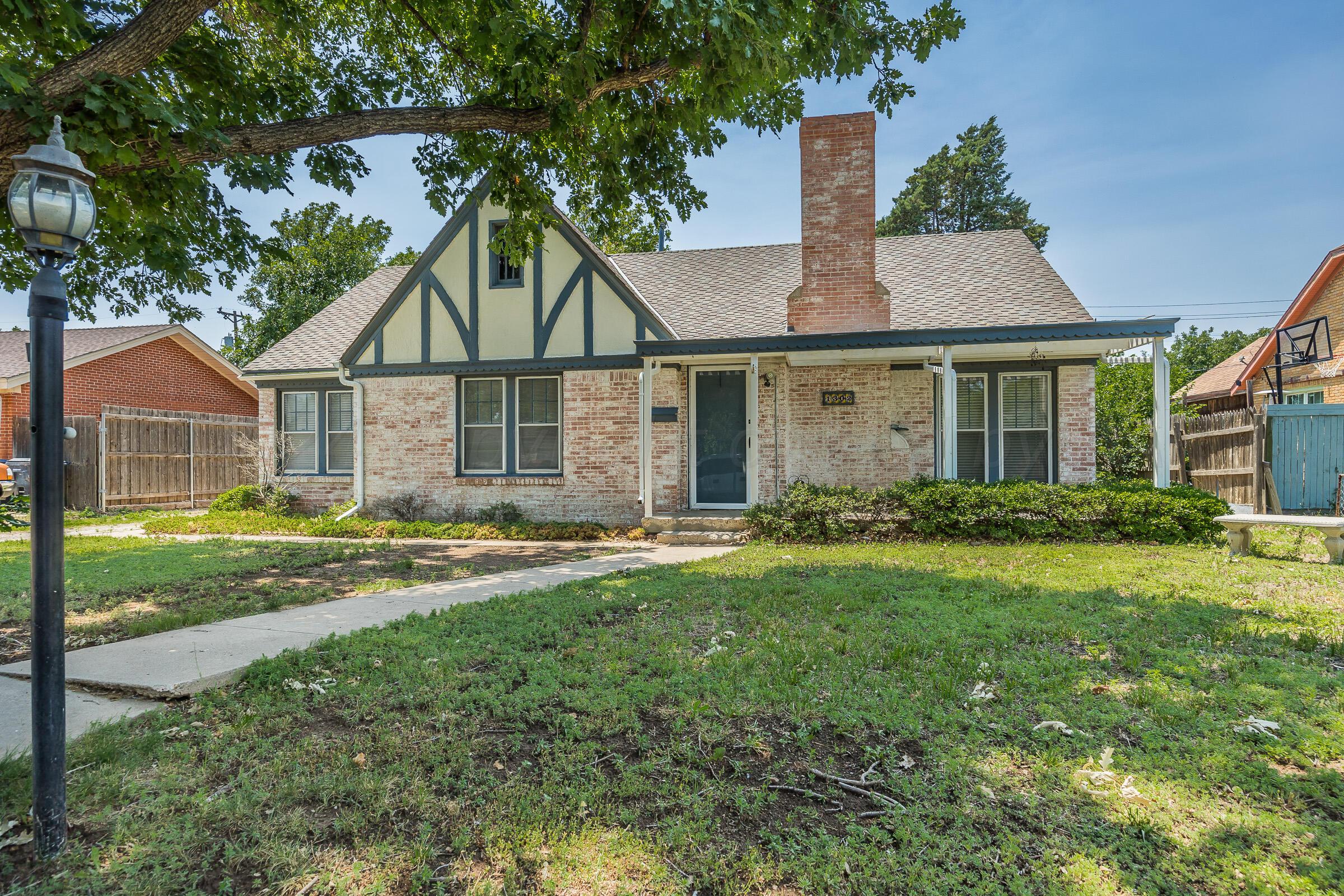 front view of a house and a yard