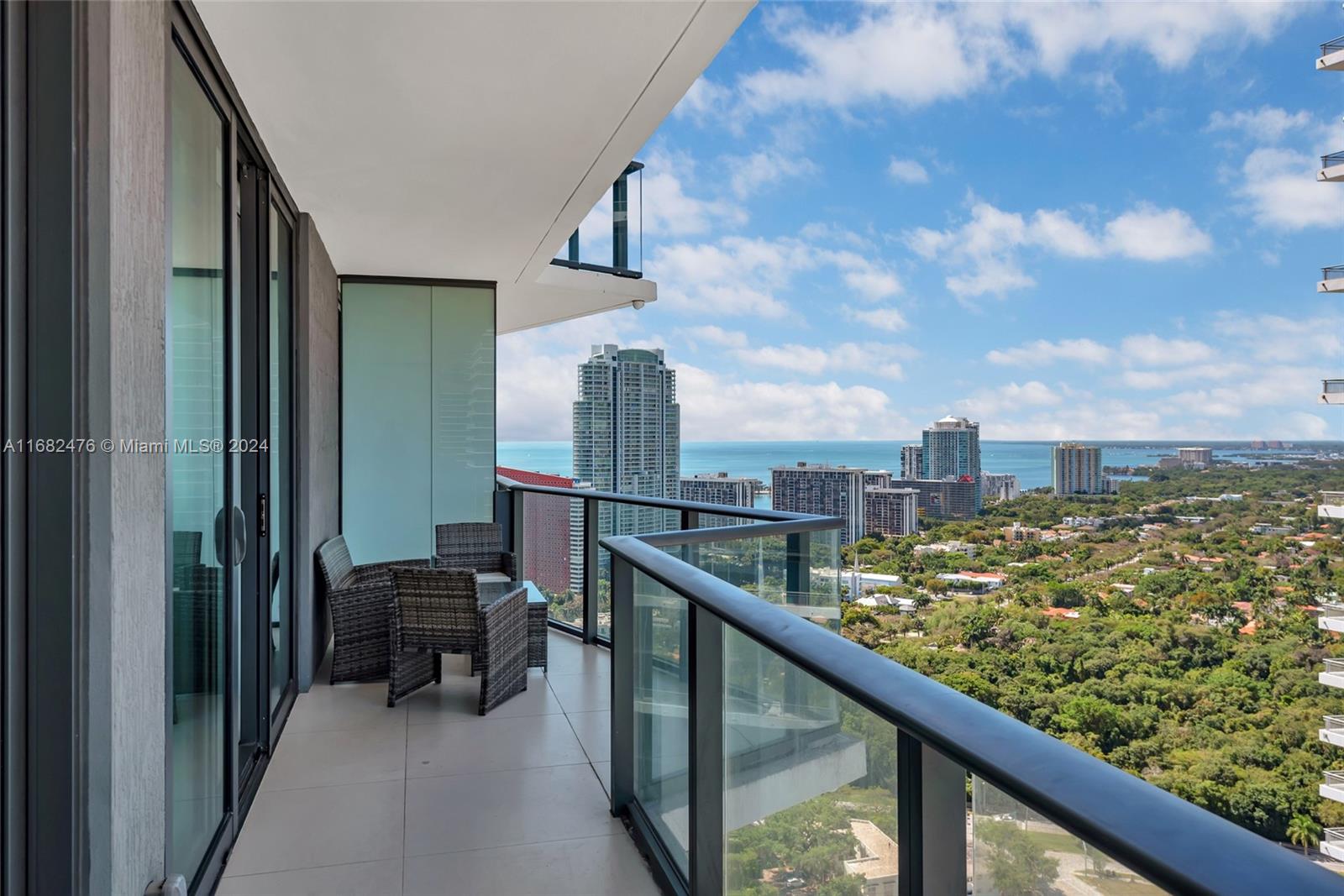 a view of balcony with furniture