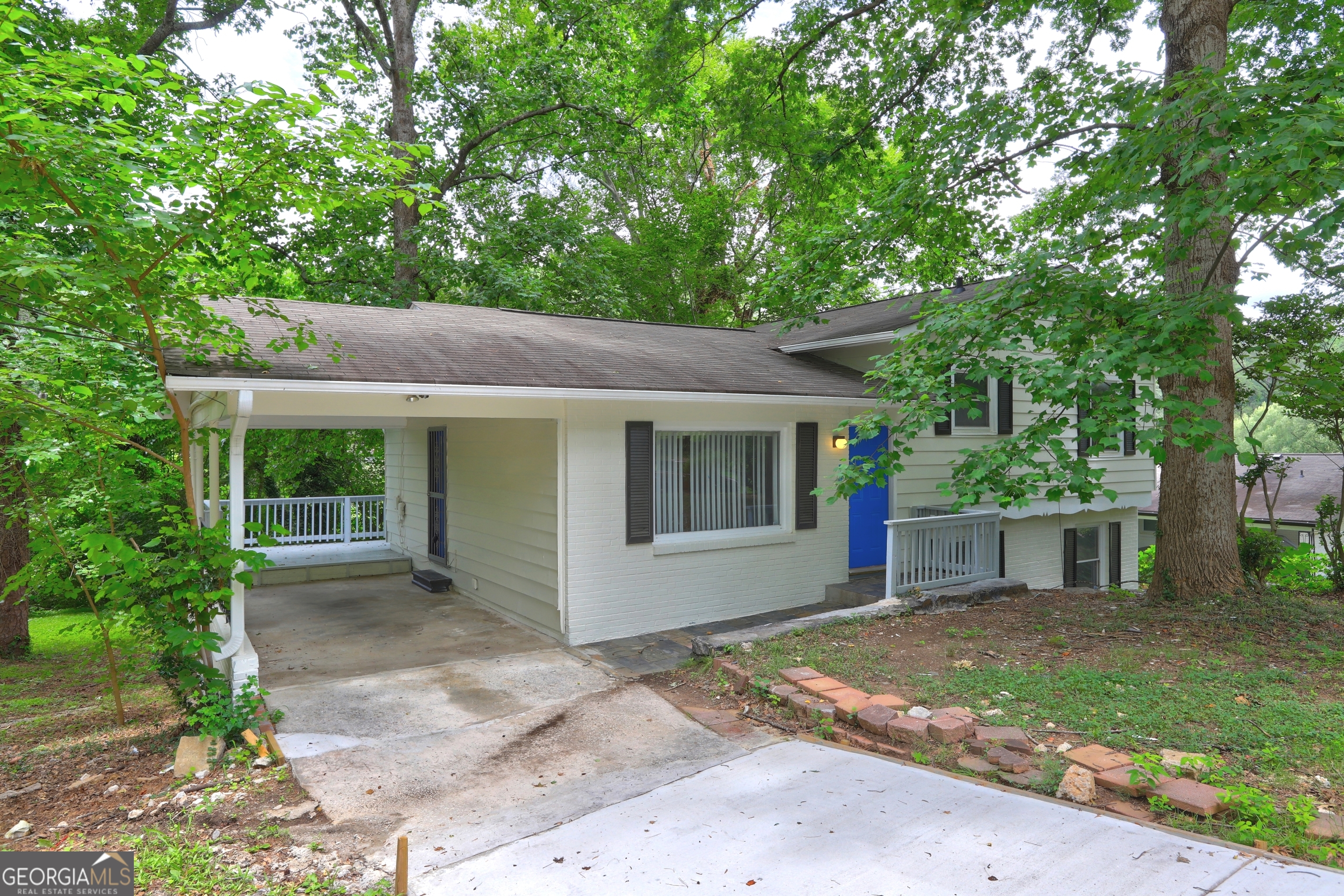 front view of a house with a yard