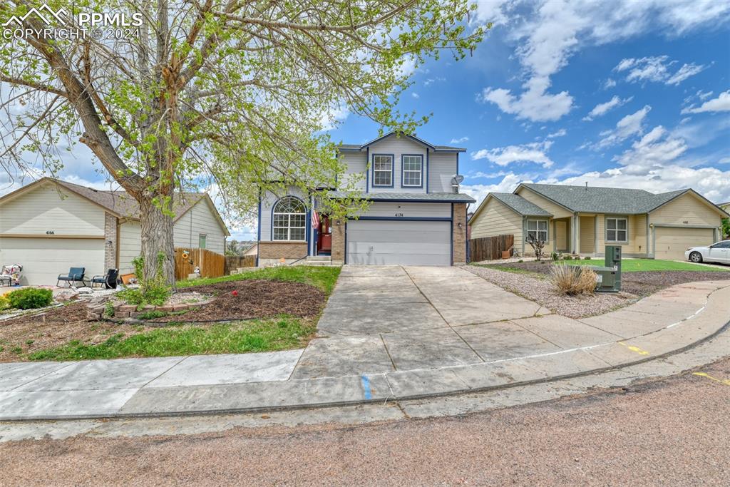 View of front property featuring a garage