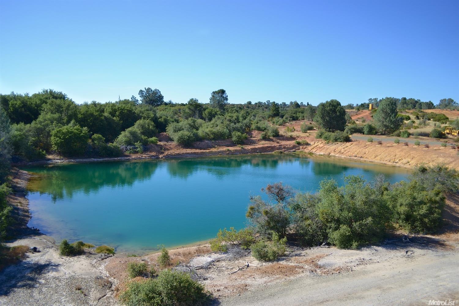 a view of a lake with a city