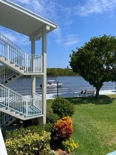 a view of a deck with a yard