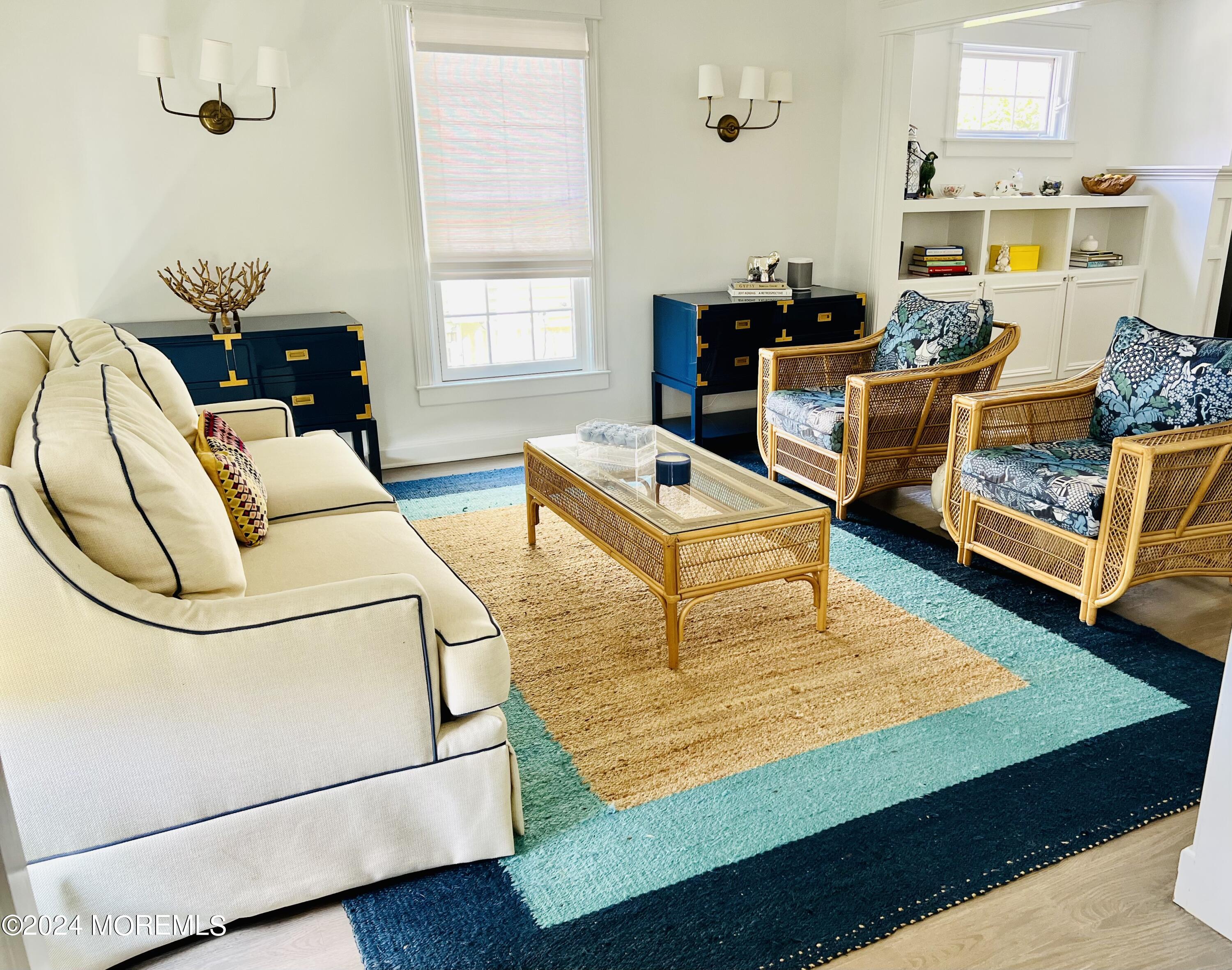 a living room with furniture and a table