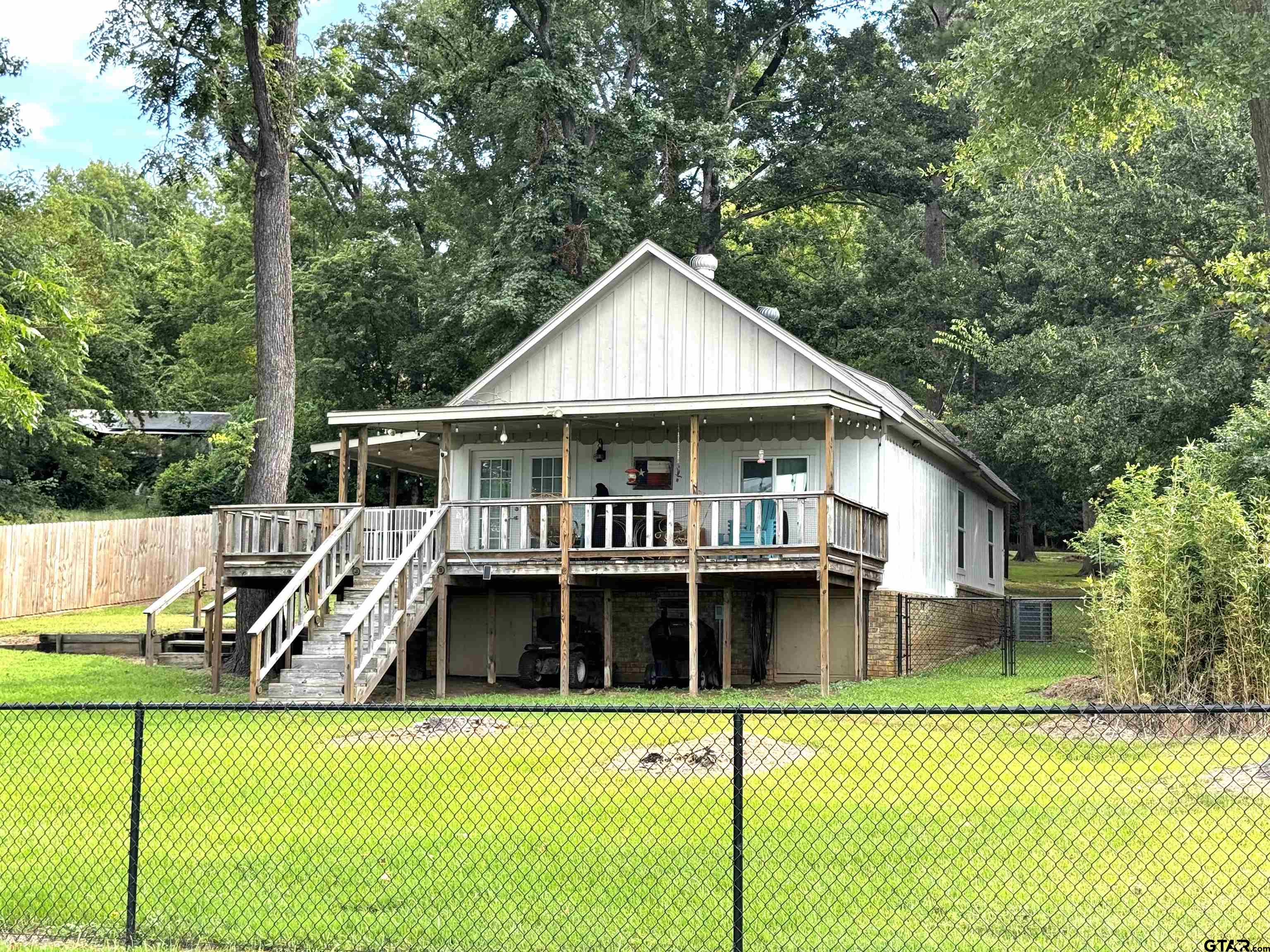 a view of a house with a swimming pool