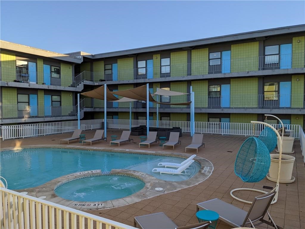 a view of a house with swimming pool