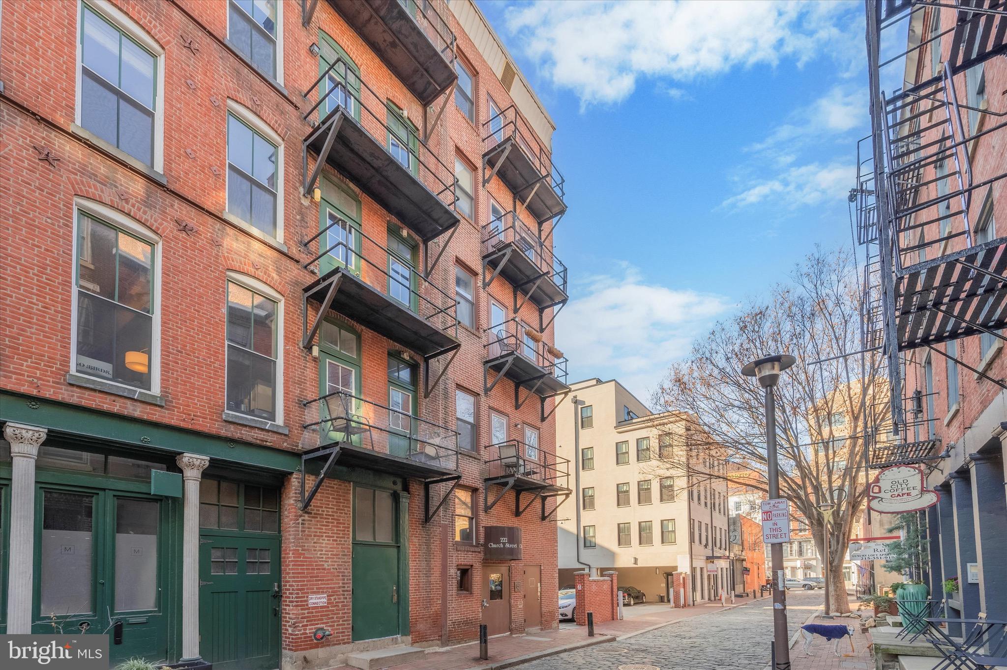 a view of a building with a street