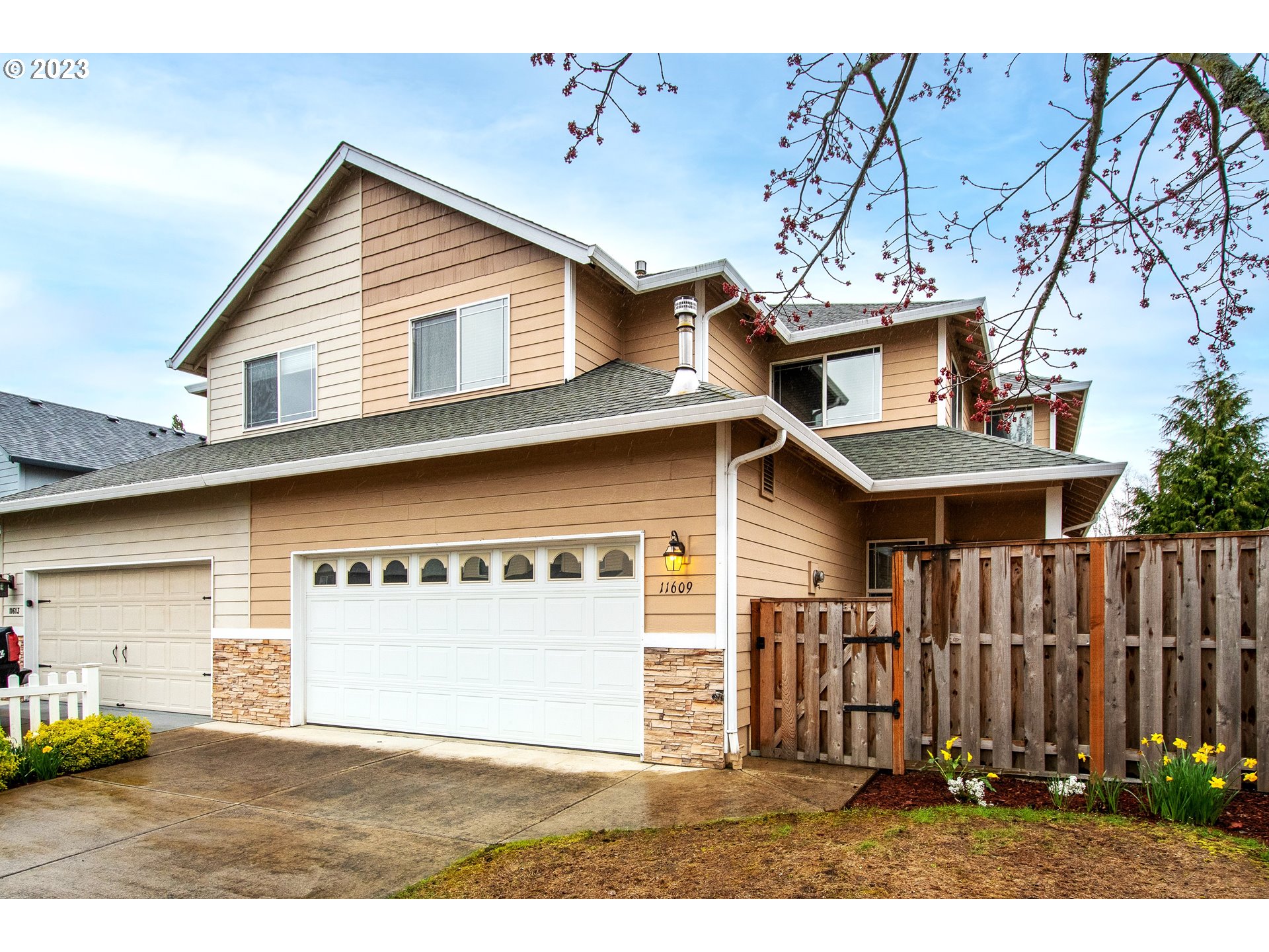 a view of a house with a garage