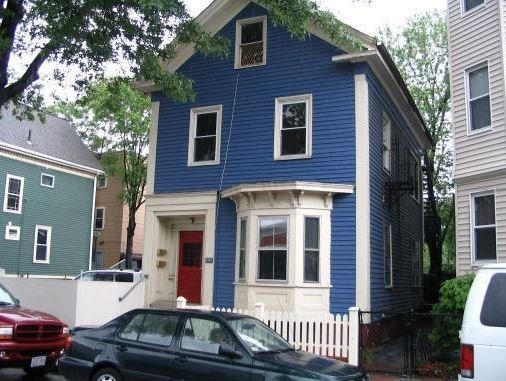 a front view of a house with outdoor space