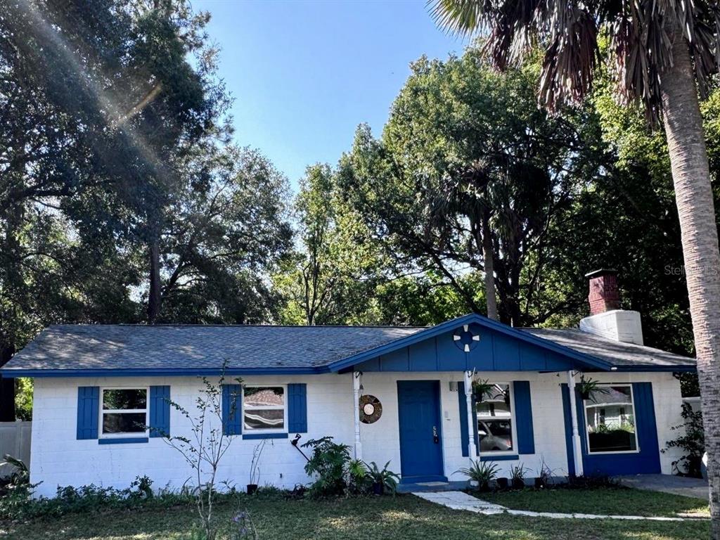 front view of a house with a yard