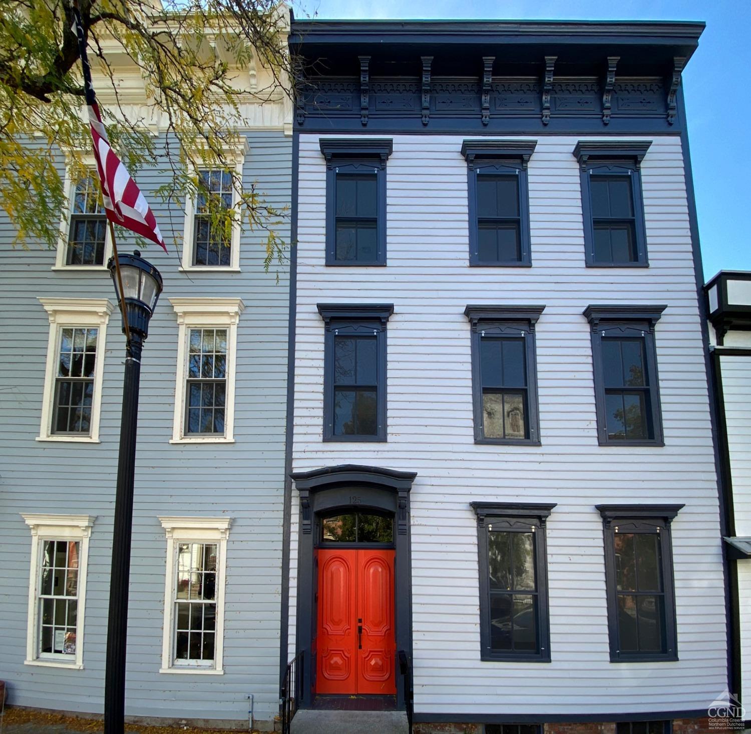 a front view of a multi story residential apartment building