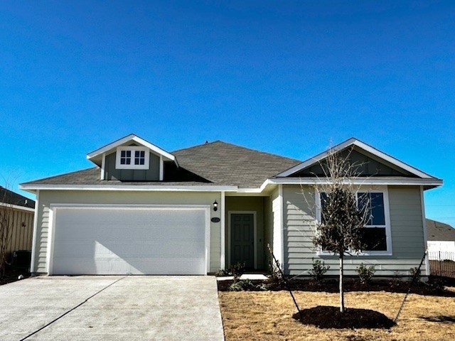 a front view of a house with street