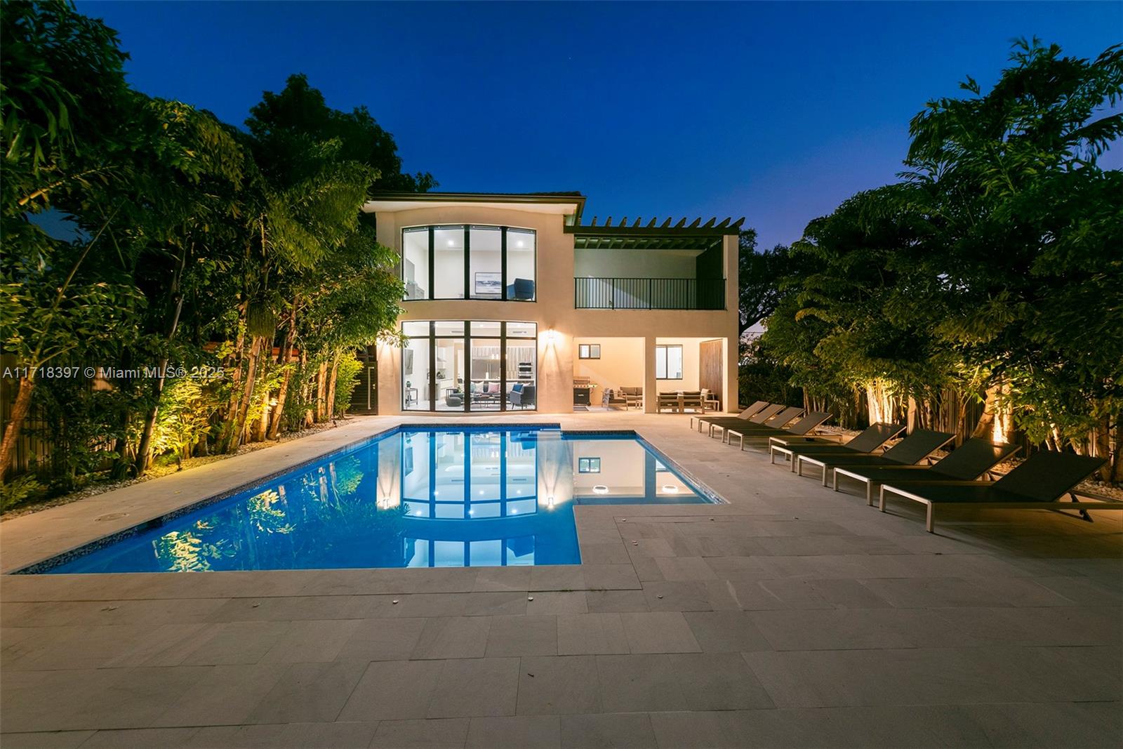 a view of a house with a swimming pool