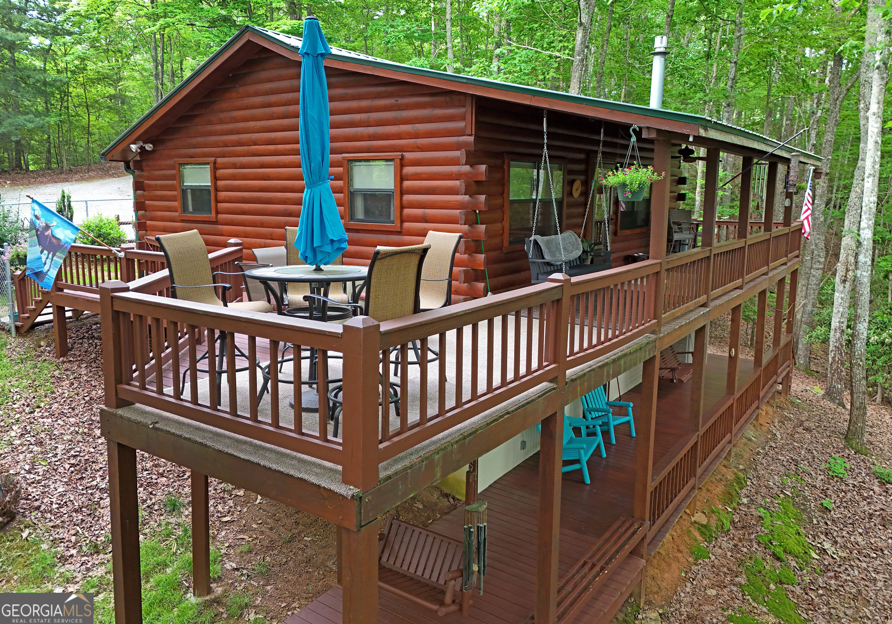 a view of a wooden deck with a bench