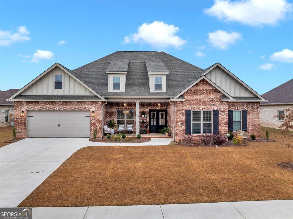 a front view of a house with a yard