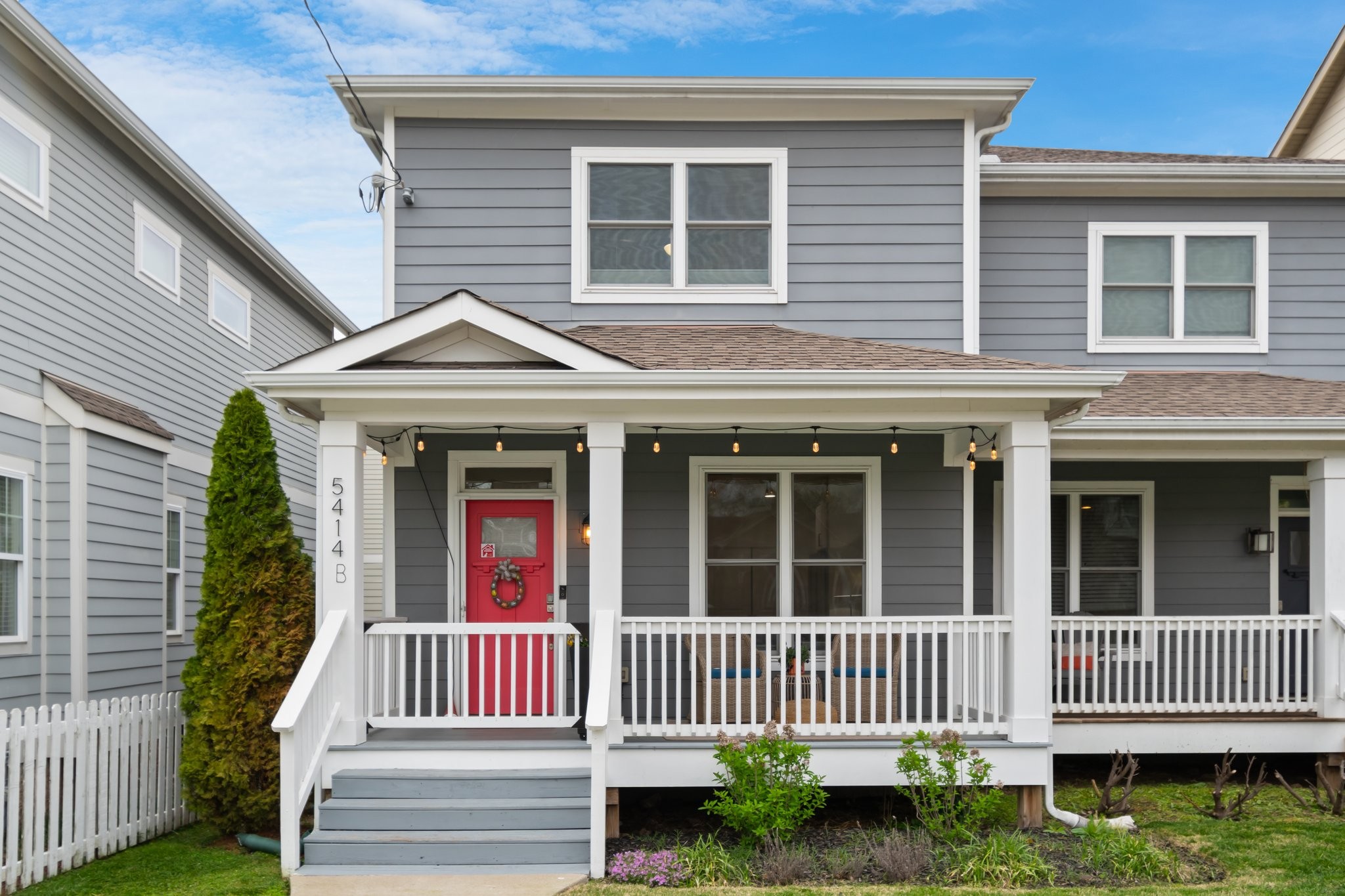 a front view of a house with a porch