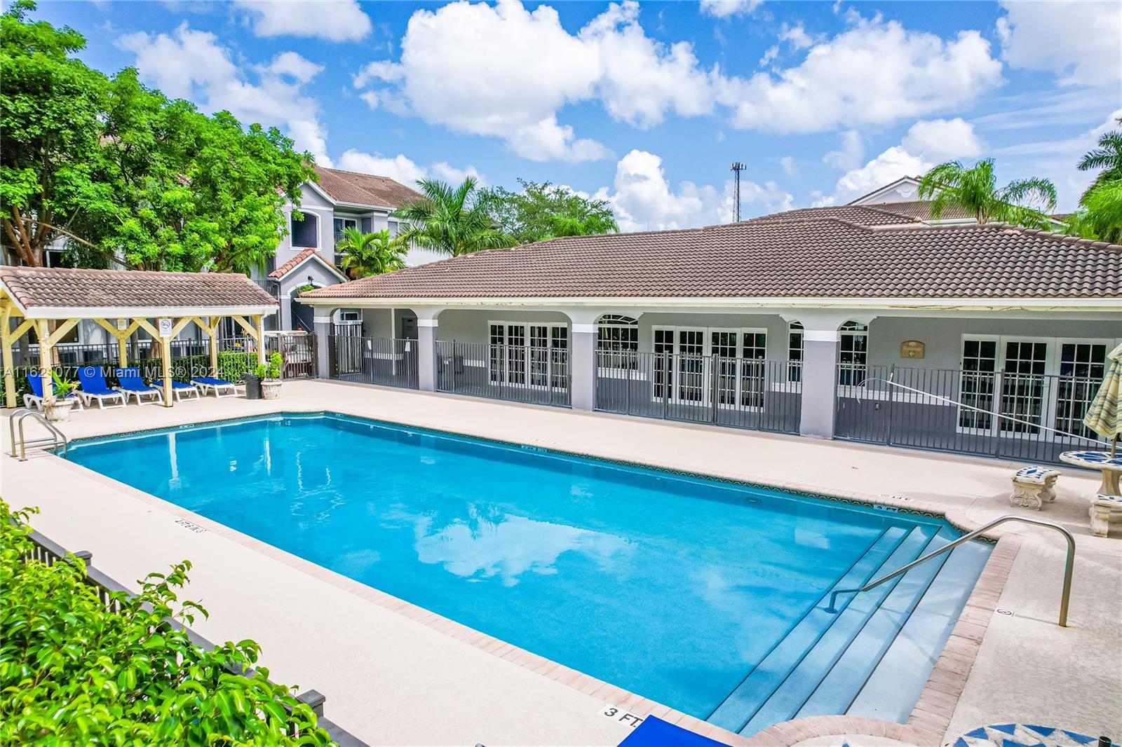 a view of a house with swimming pool