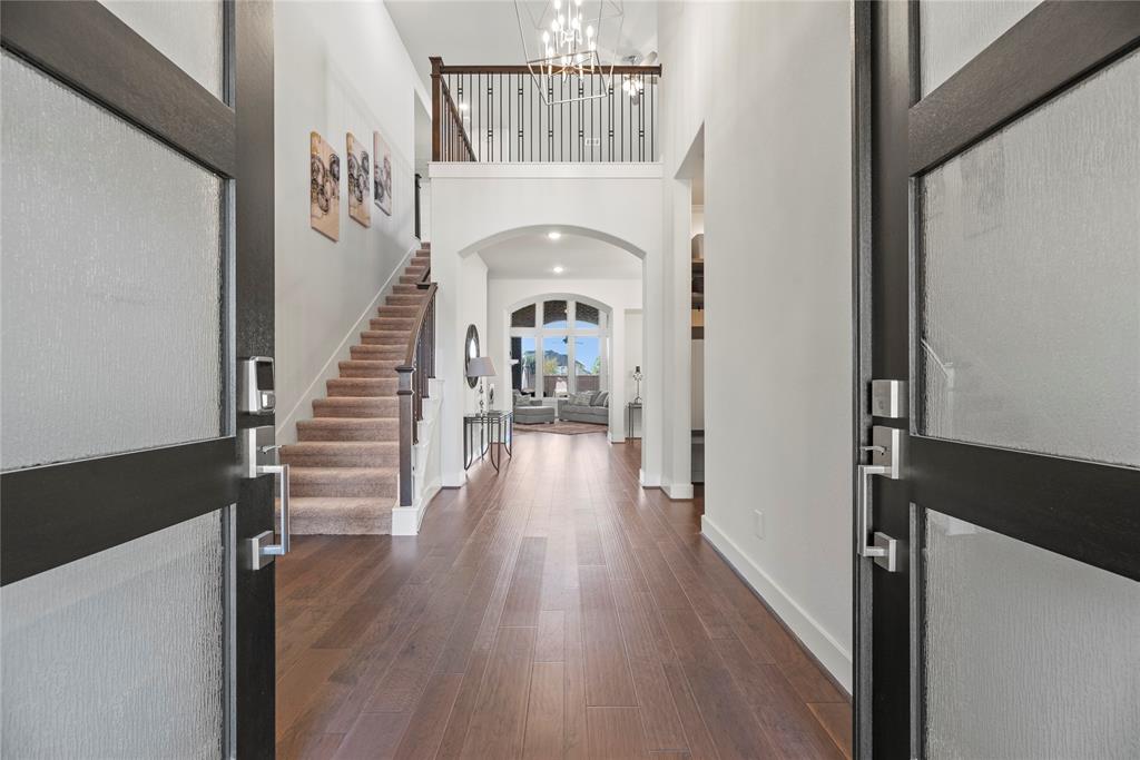 Whether it's for guests arriving for the first time or for the homeowners returning at the end of the day, stepping through this doorway is sure to evoke a sense of pride and joy.