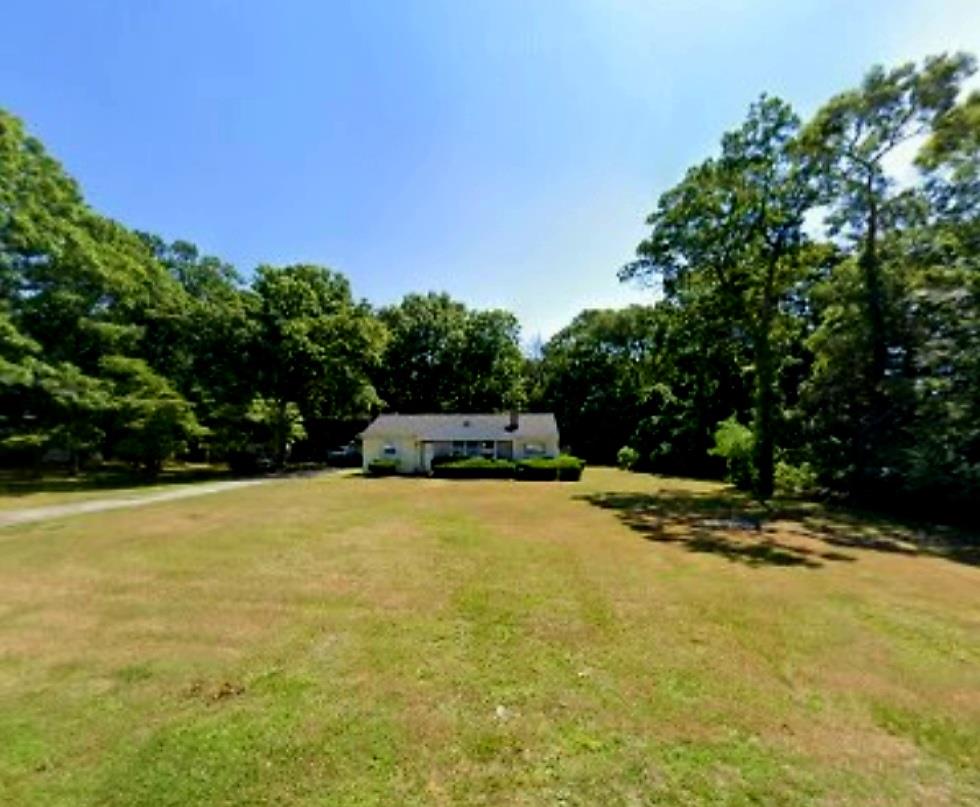 a backyard of a house with trees