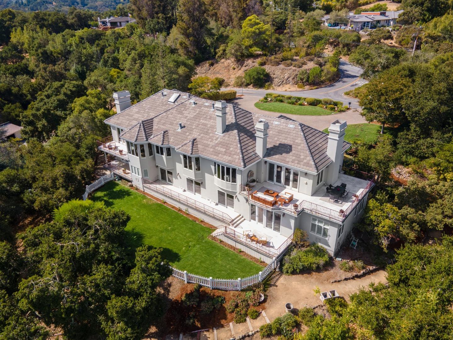 an aerial view of a house with a garden