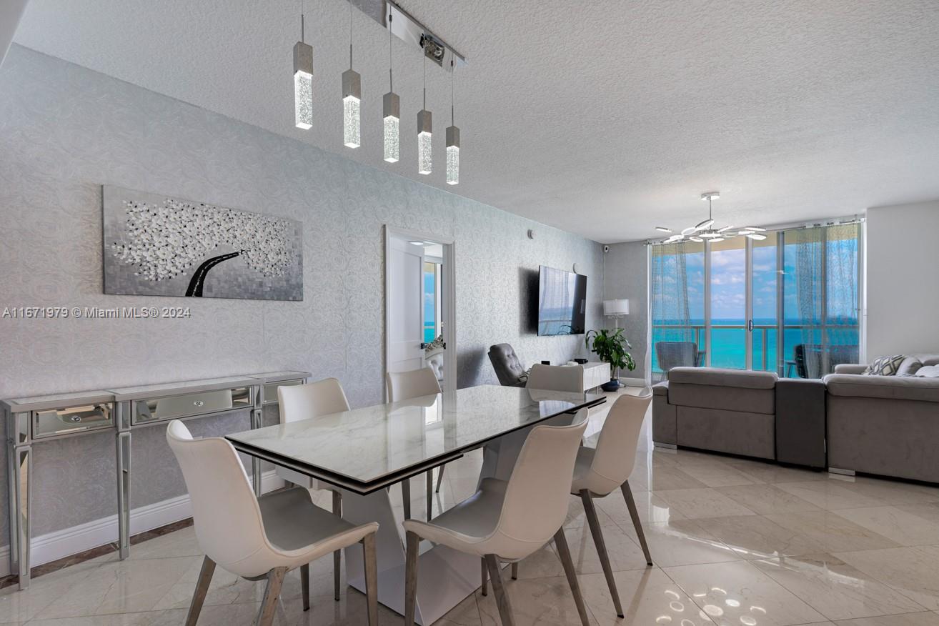 a view of a dining room with furniture