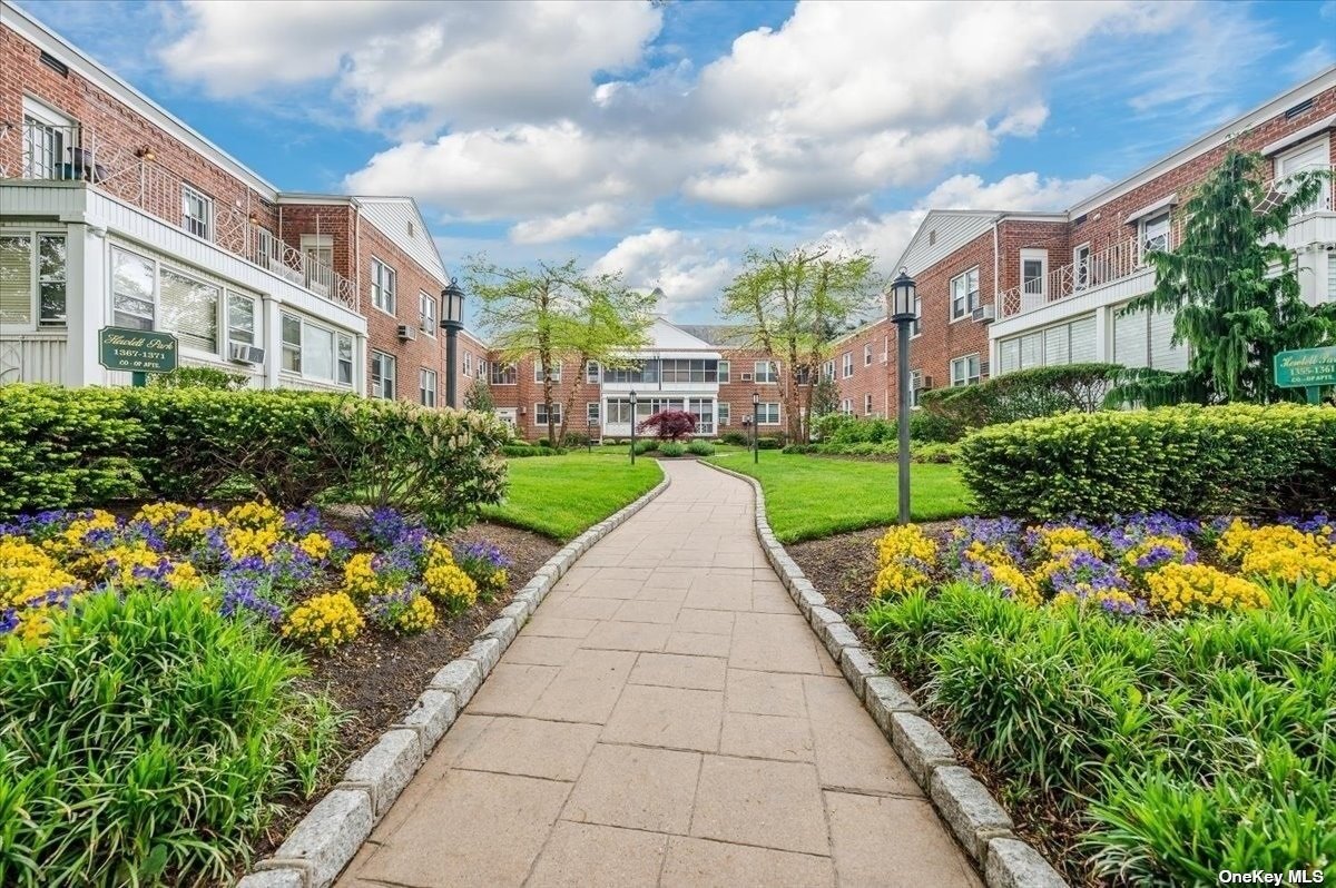 a view of a garden with a pathway