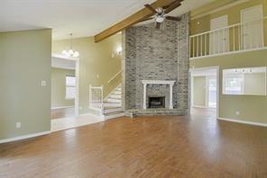 a view of a hallway with a fireplace