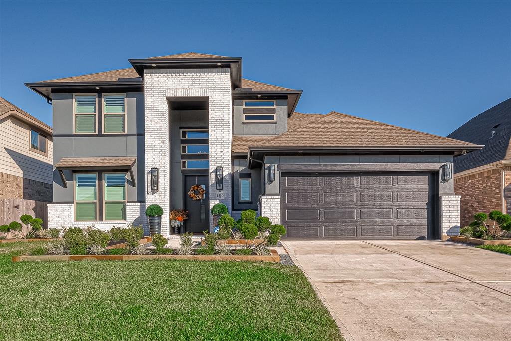 Welcome to this charming two-story home, showcasing a perfect blend of modern comfort and classic design. Two attached garages are conveniently located offering ample space for vehicles and storage.