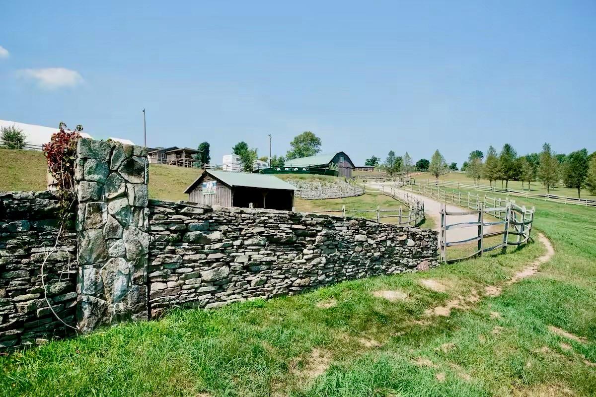 View of Ranch community featuring a rural view and an outbuilding