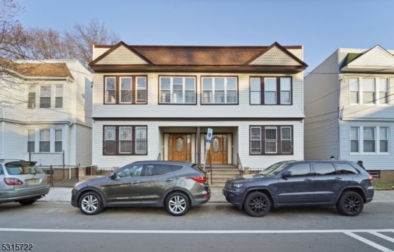 a car parked in front of a house