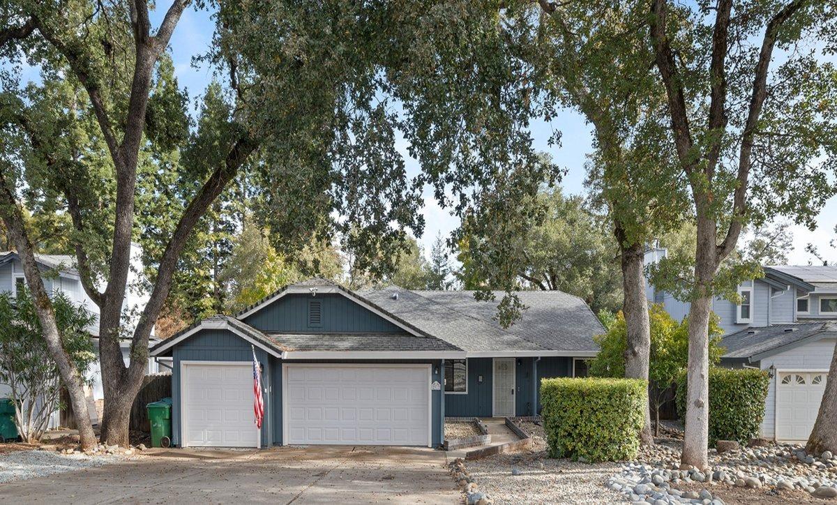 a house with trees in the background